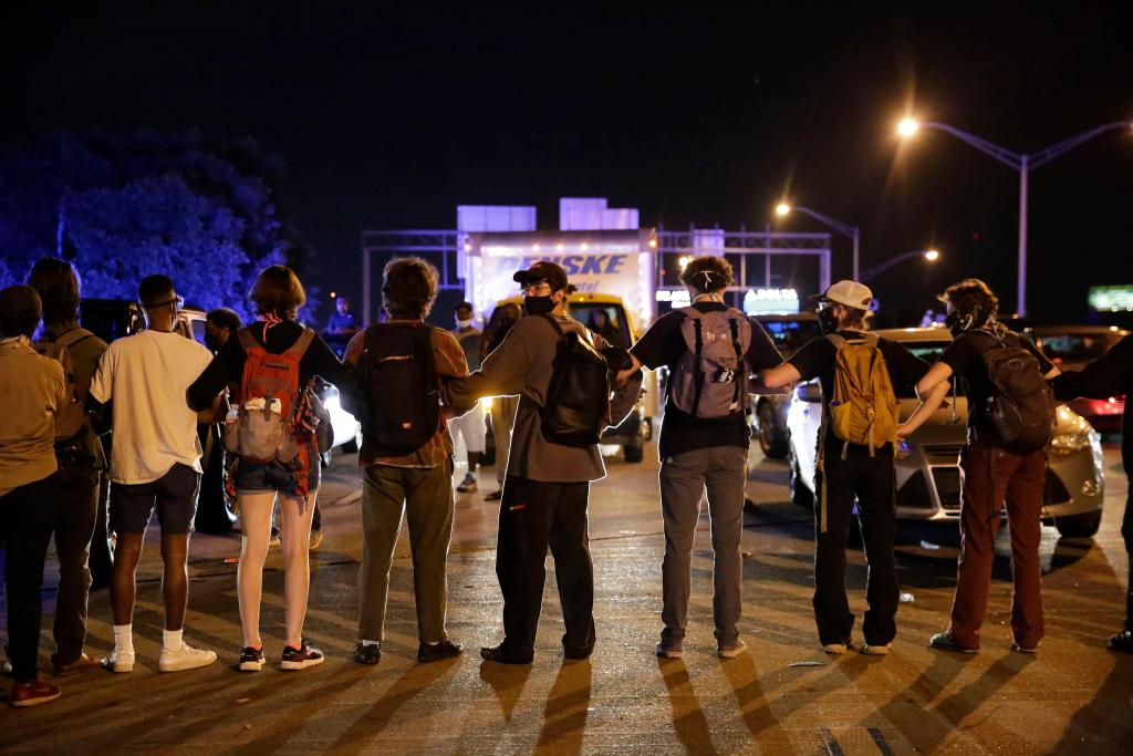 The Latest: 7 Minneapolis officers quit in wake of
protests 1