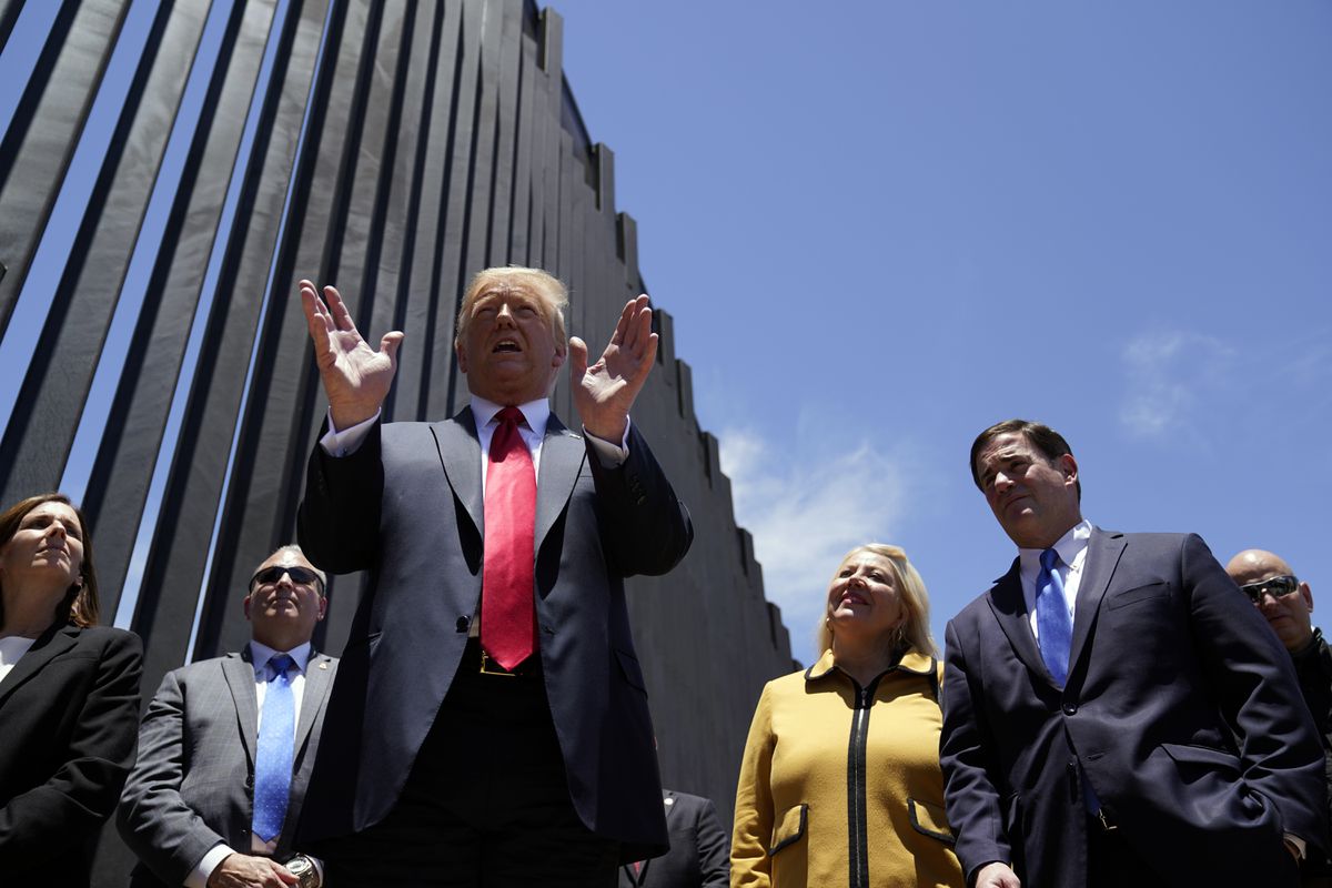 As coronavirus cases surge, Trump turns attention to border
wall in Arizona 1 As coronavirus cases surge, Trump turns attention to border
wall in Arizona 1