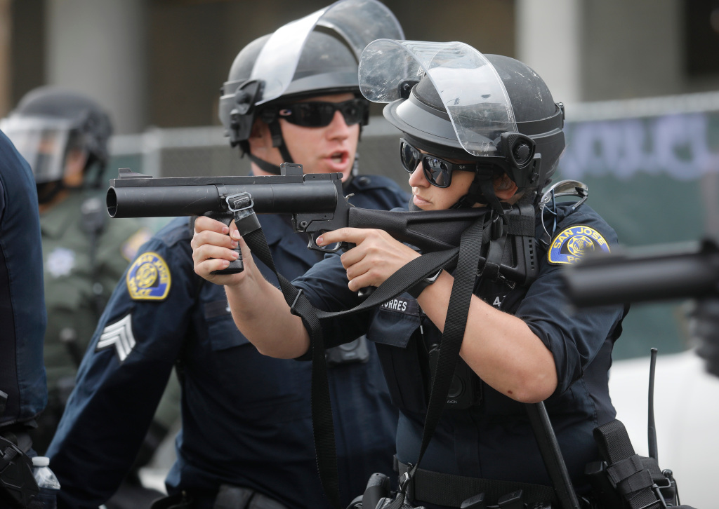 After ugly protest response, police and cities vie for rapid
change 1