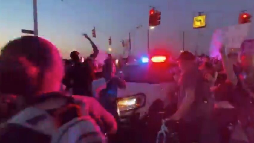 ‘He just floored it’: Detroit police SUV plows through
protesters, flings people who climbed on hood 1