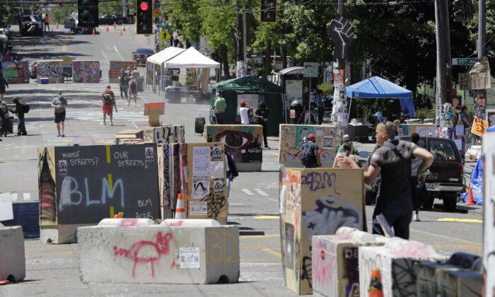Seattle Mayor Folds On 'Summer Of Love' - Moves To Dismantle
CHOP Protest Zone After Shootings 1