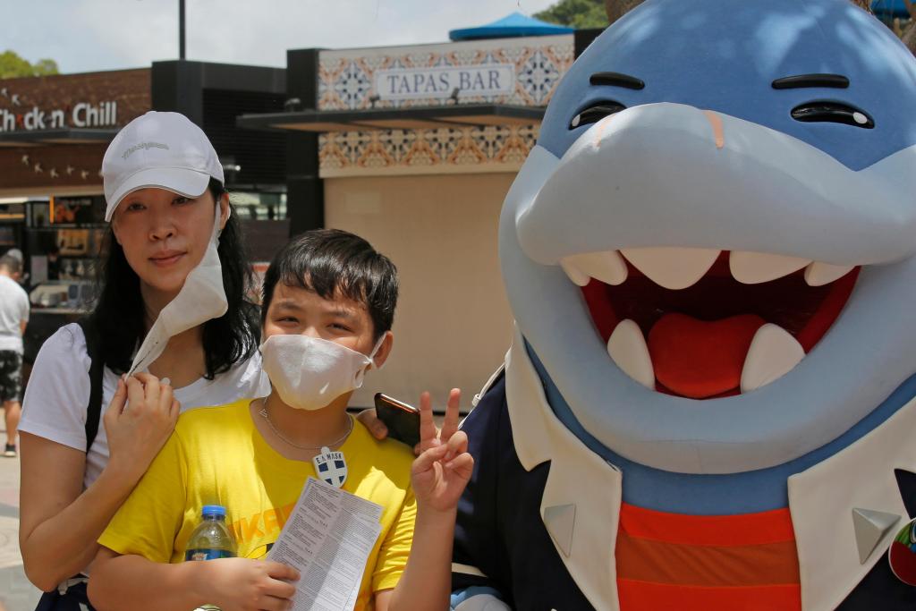 The Latest: Coronavirus spike continues in South
Korea 1
