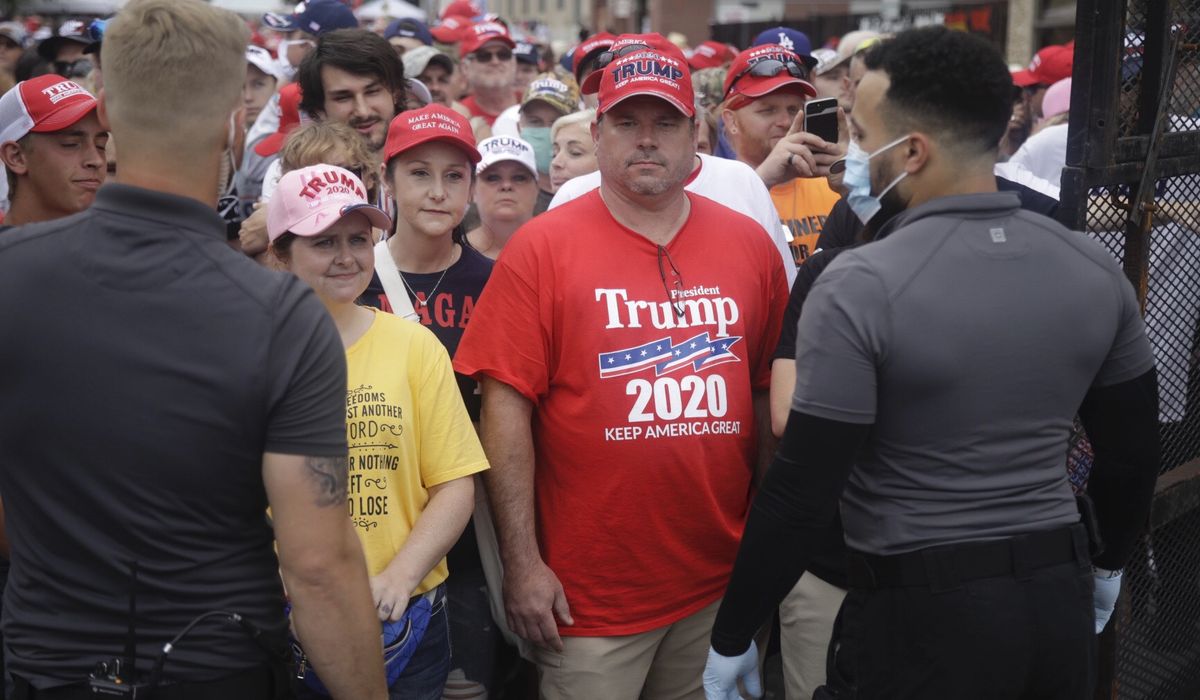 Six members of Trump team in Tulsa test positive for
coronavirus ahead of campaign rally 1