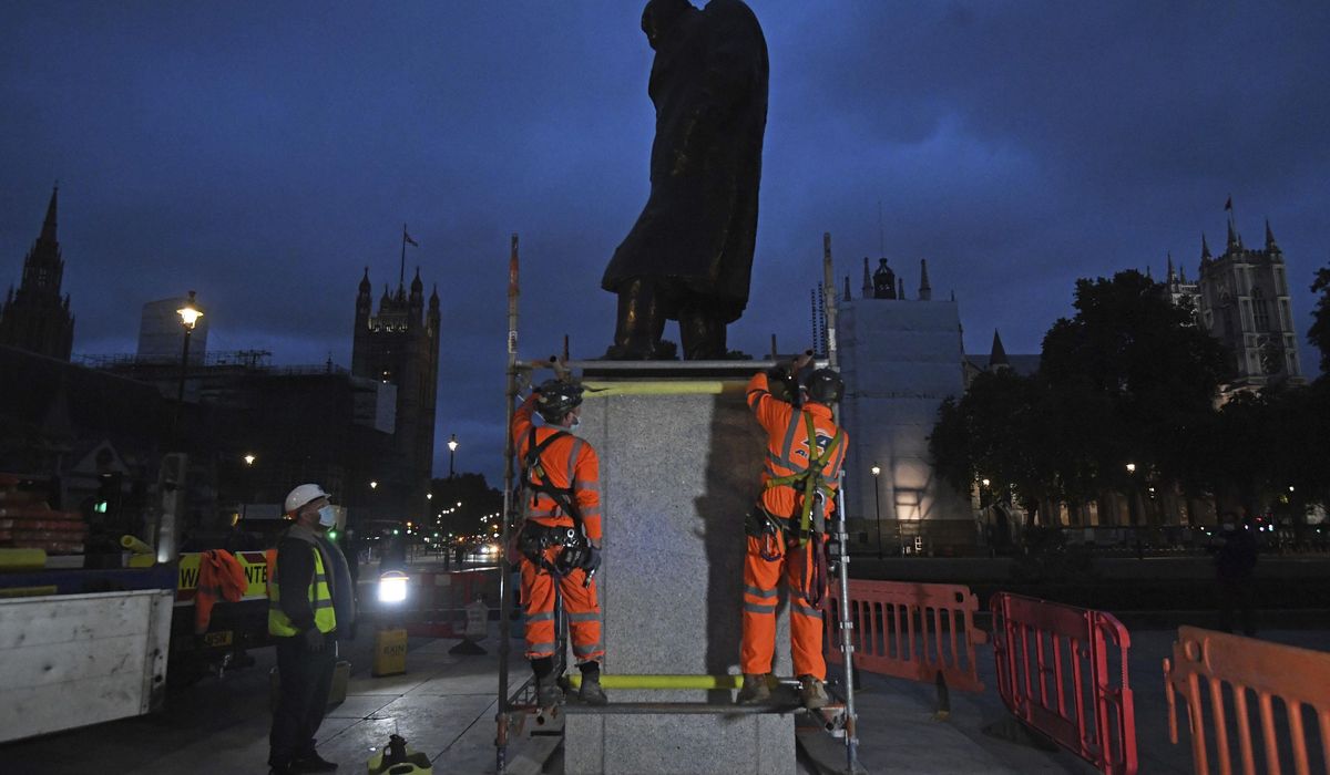 Statues boarded up in London as more protests
expected 1