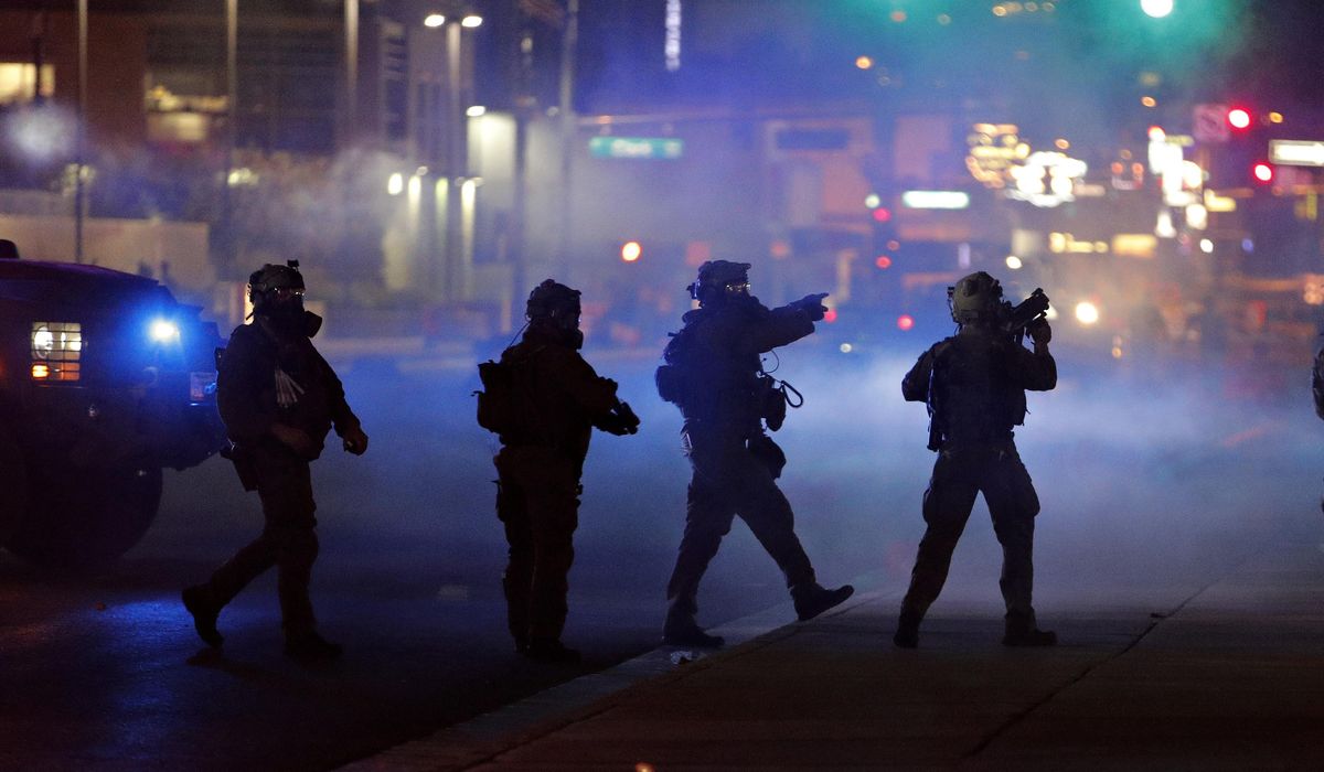 US holding 3 accused of terror attack against Vegas
protests 1