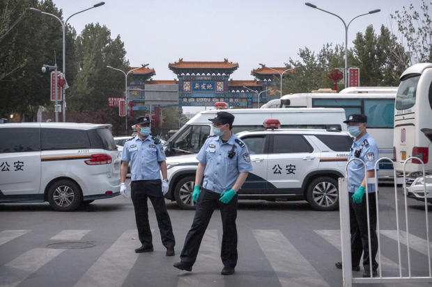 Beijing closes food market after more than 50 test positive
for coronavirus 1