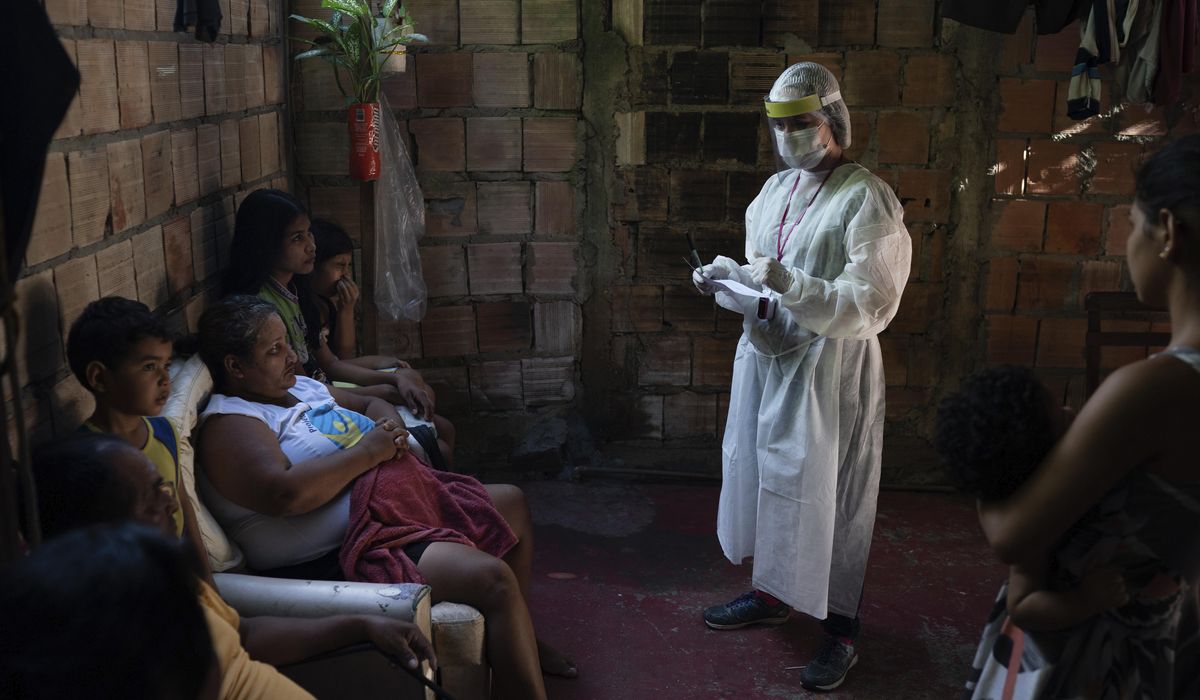 The Latest: Pakistan, India coronavirus cases, deaths
spike 1