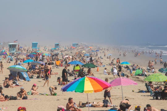 In CA: In the O.C., the protesters have it — masks are no
longer required 1