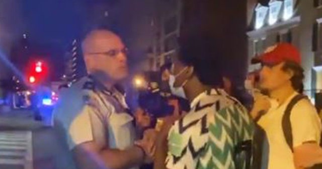 Protesters Harass Black Officers: ‘Nothing but House
N***ers’ 1