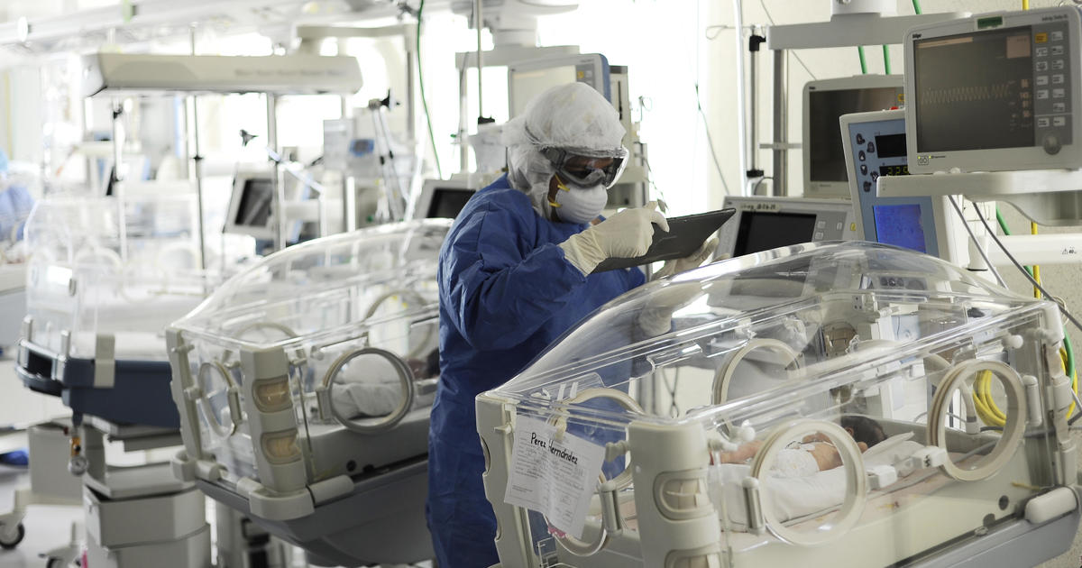 Triplets test positive for coronavirus on the day they're
born 1
