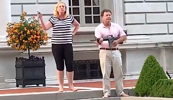 Couple packing heat during BLM protest are lawyers for a
police-brutality victim 1
