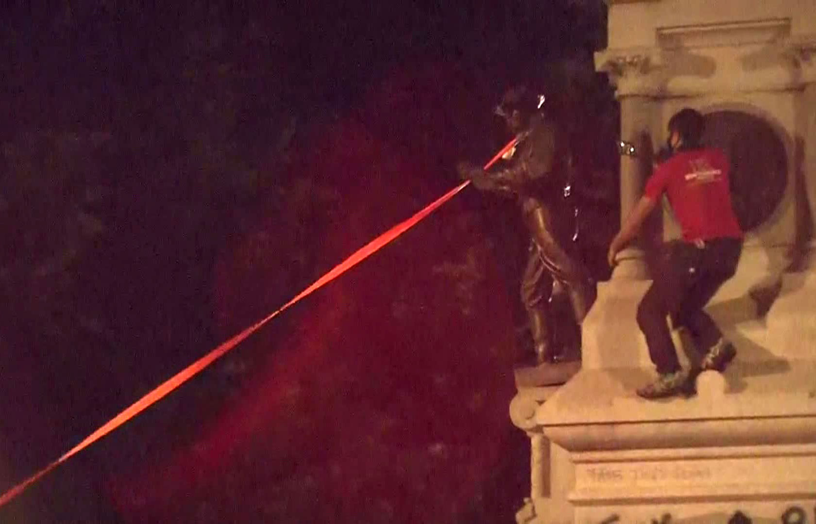 Protesters pull down two statues from Confederate monument
at North Carolina State Capitol 1