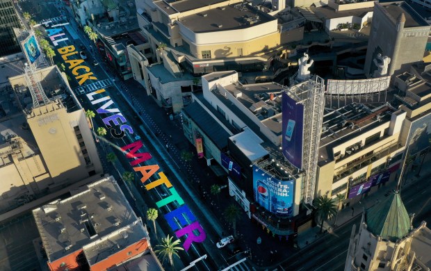 Thousands gather for Hollywood march as protesters return to
streets across Southern California 1