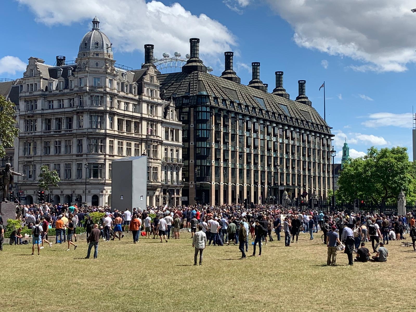 Protesters gather in London as statues boarded up amid fears
of violence from far-right hate groups 1