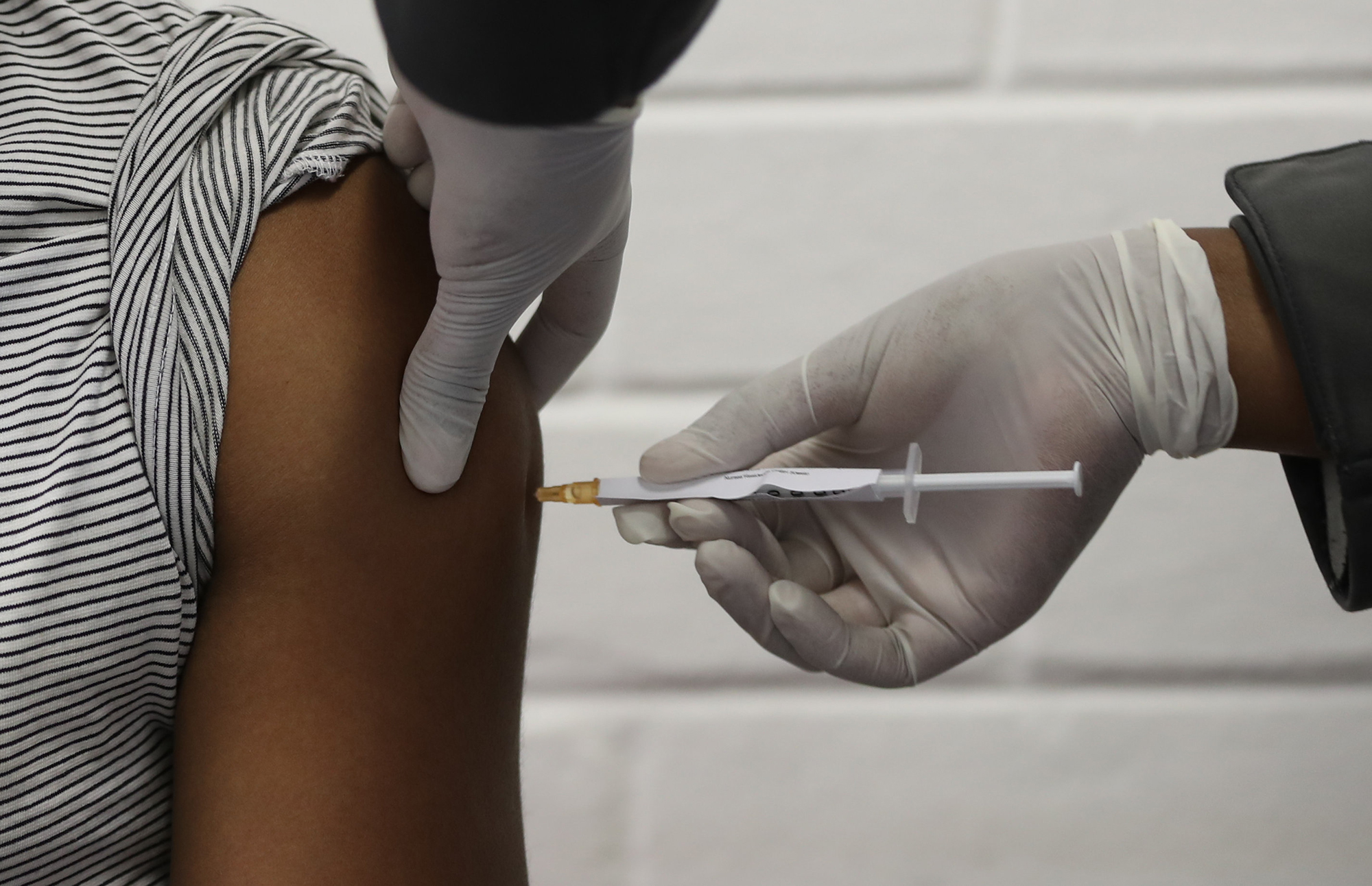 US average of daily new coronavirus cases hits highest point
of pandemic 1