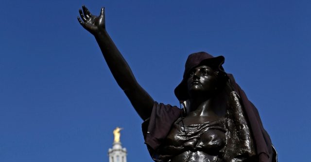 Protesters Topple 'Forward' Statue Outside of Wisconsin
State Capitol 1