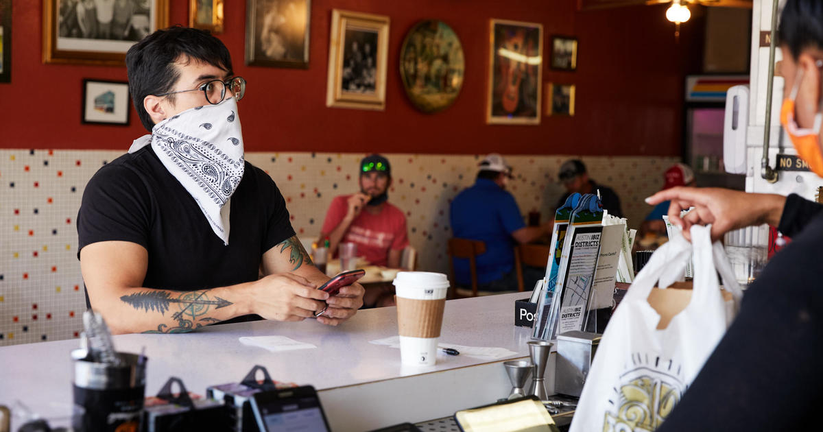 Texas halts reopening amid surge in coronavirus
cases 1