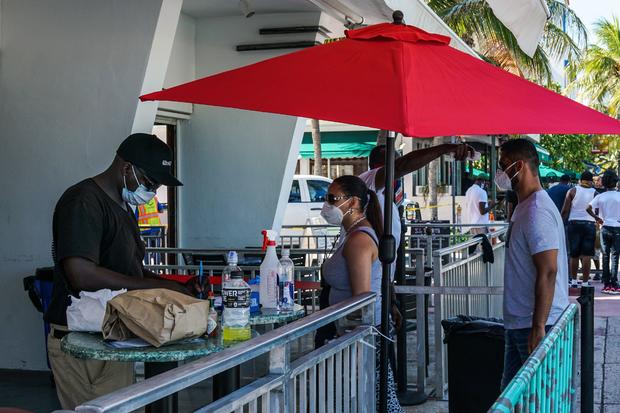 6 states report record-high jumps in new coronavirus
cases 1