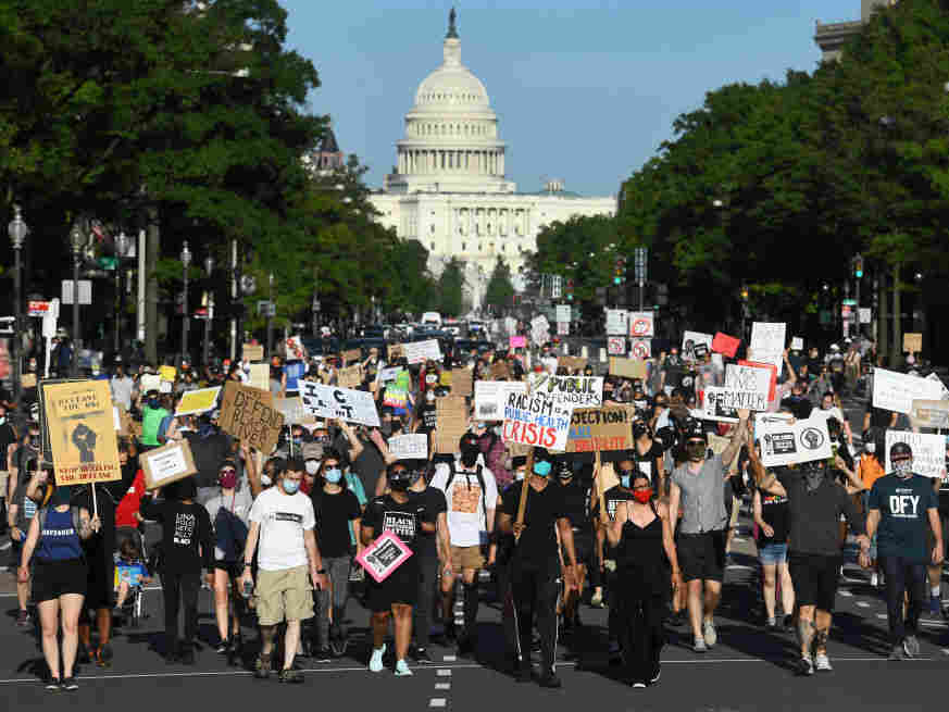 Protesting? Here's How To Help Keep Your Family Safe From
COVID-19 When You Go Home 1