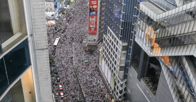 Hong Kong Activists March on First Anniversary of
Protests 1