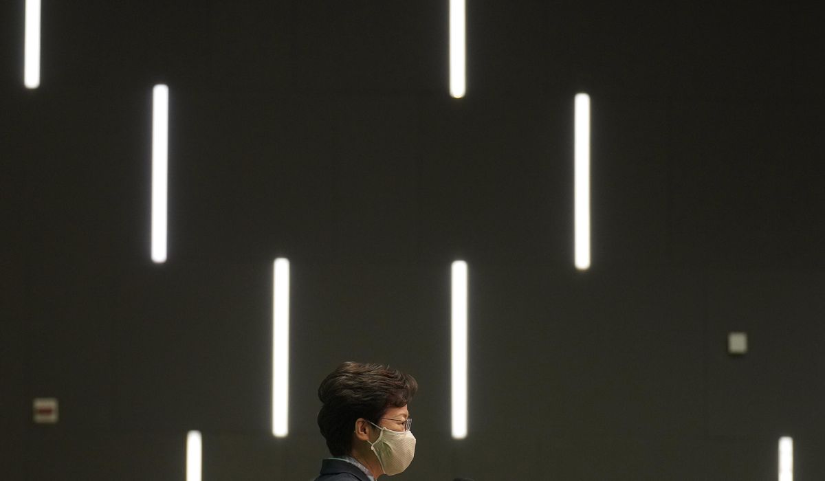 Hong Kong leader says all should learn from year of
protest 1