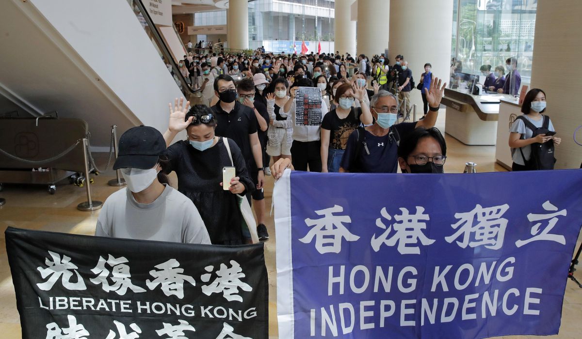 Hong Kong protest marks anniversary of violent police
clash 1