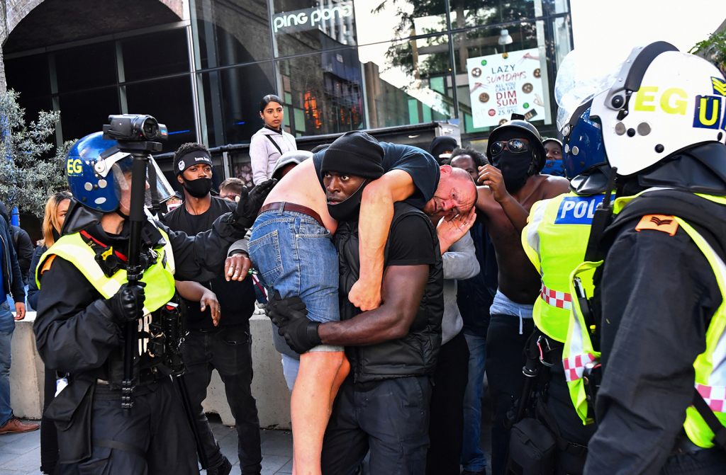 White man rescued by Black Lives Matter protester is former
police officer 1