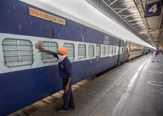 Train cars to serve as hospitals as COVID-19 surges in
Indian capital 1