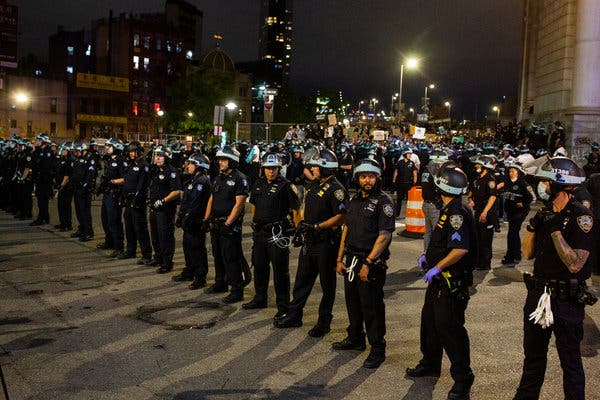 Protests in N.Y.C.: Police Officers Without Face
Masks 1