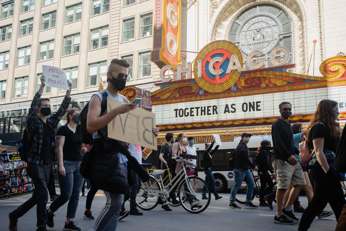 Would-be revolutionaries, advocates for police reform march
downtown on 2-week anniversary of massive George Floyd
protest 1