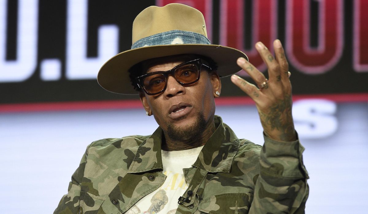 D.L. Hughley tests positive for coronavirus after collapsing
on stage 1
