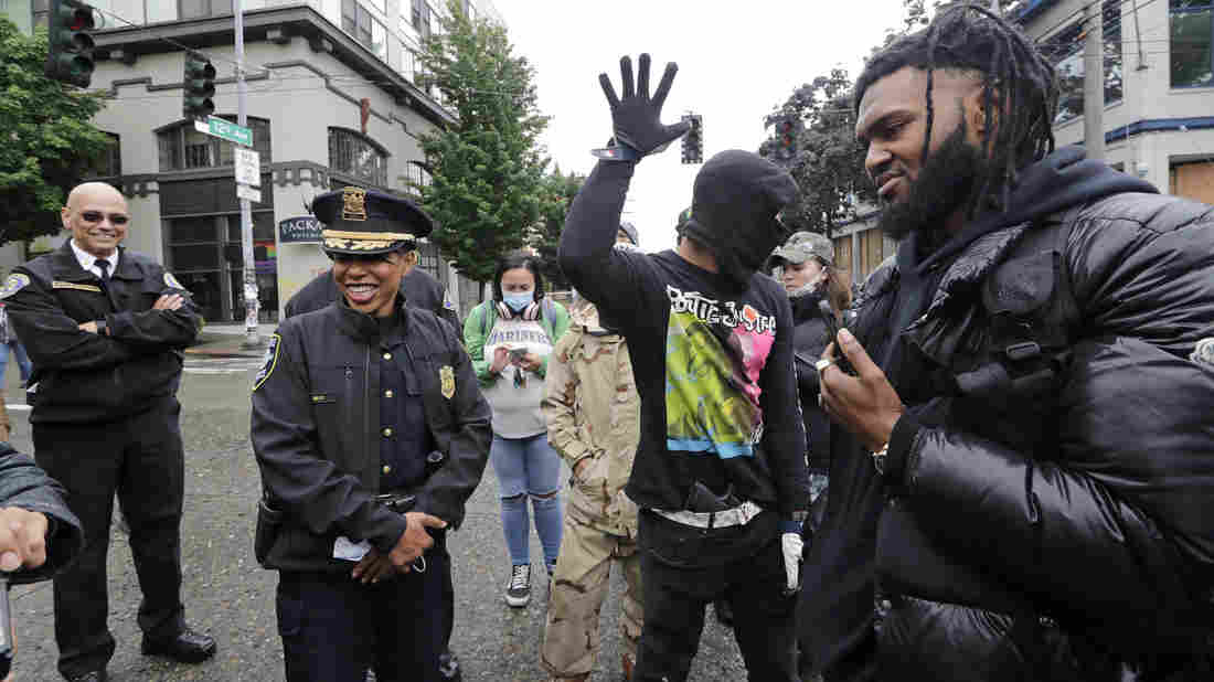 'Go Back To Your Bunker,' Seattle Mayor Tells Trump In Spat
Over Protests 1