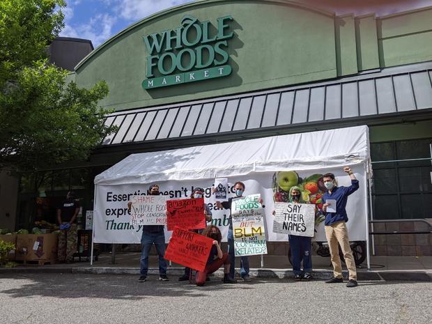 Whole Foods workers protest to wear "Black Lives Matter"
masks 1