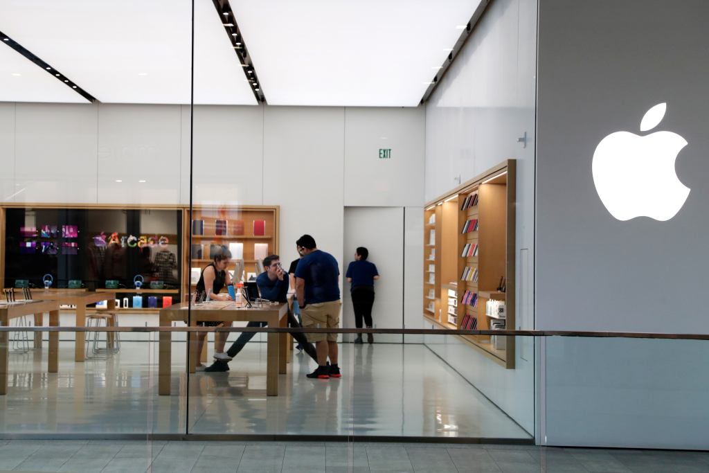 Amid coronavirus spike, Apple closes some stores
again 1