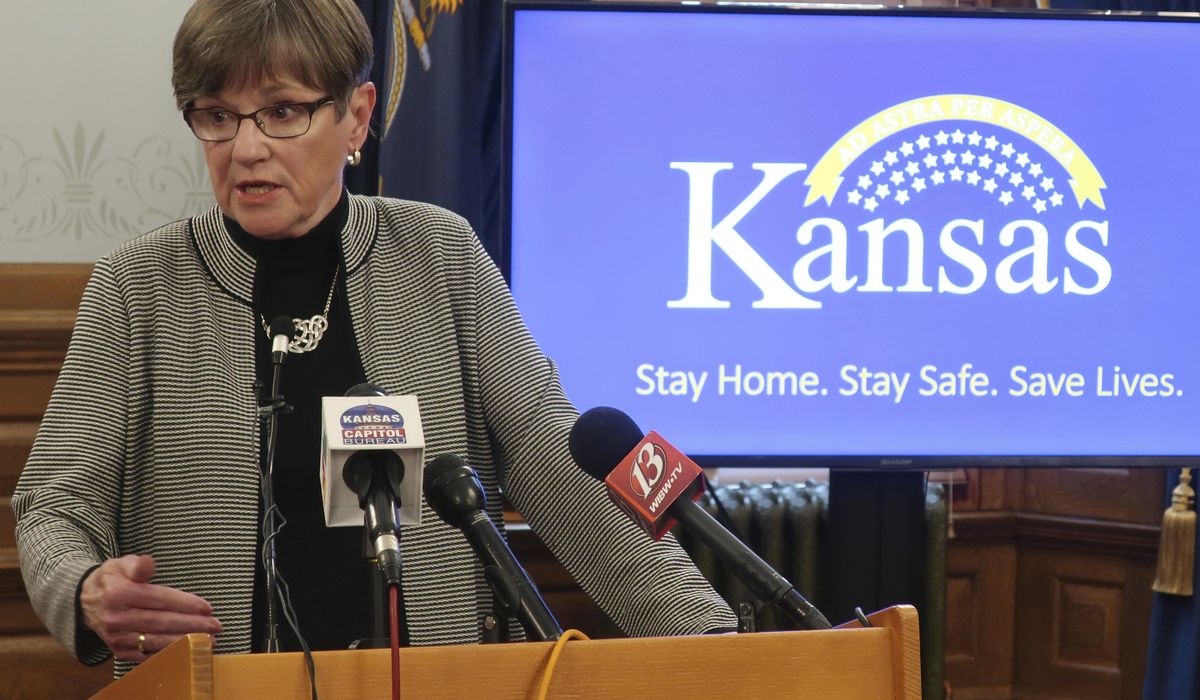 Kansas lawmakers, governor, working on new COVID-19
measure 1