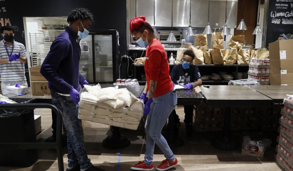 Teens at Dallas cafe make meal kits for needy amid
COVID-19 1