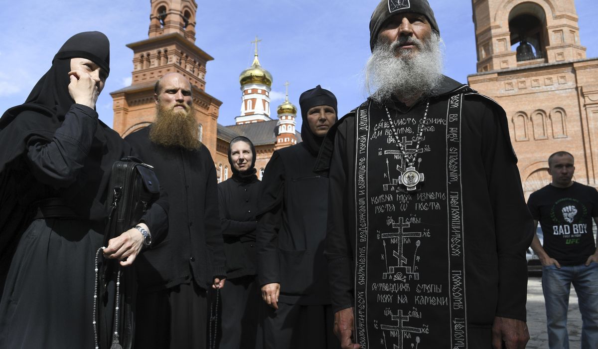 Russian monk denying coronavirus takes control of
monastery 1