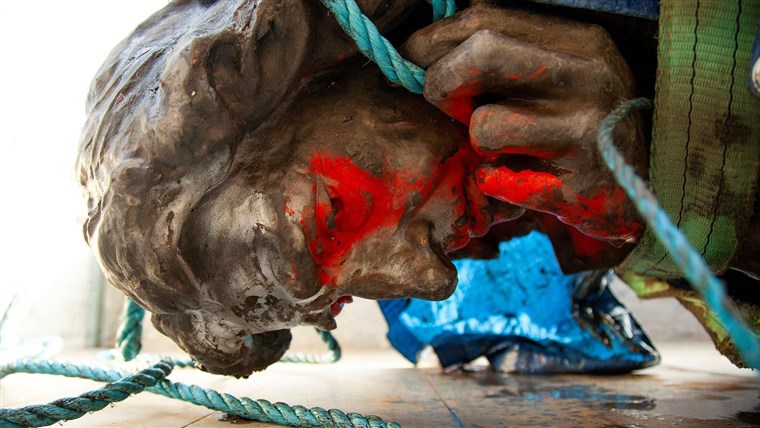 Defiant Black Lives Matter protester replaces British slave
trader statue 1