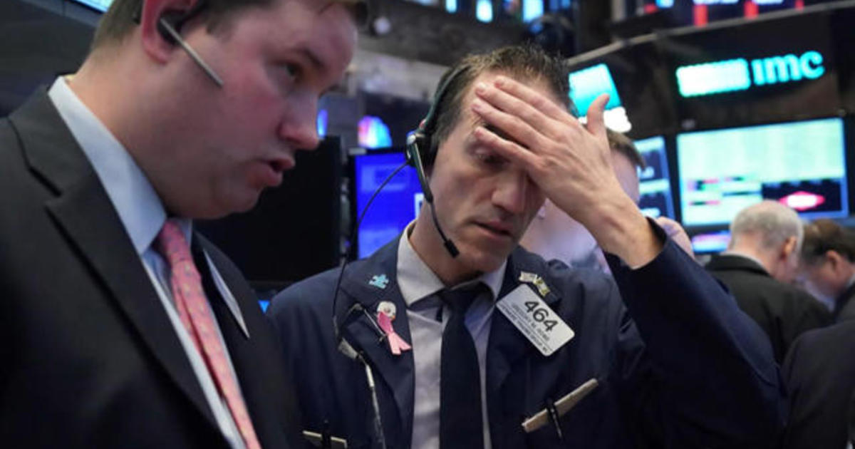 Stock markets plunge and lawmakers begin to self-quarantine
after coronavirus contact 1