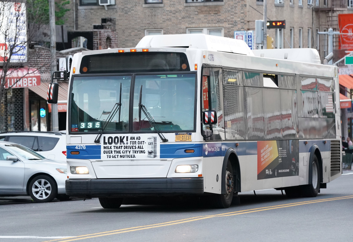 Irate bus rider breaches coronavirus shield to berate Asian
driver 1