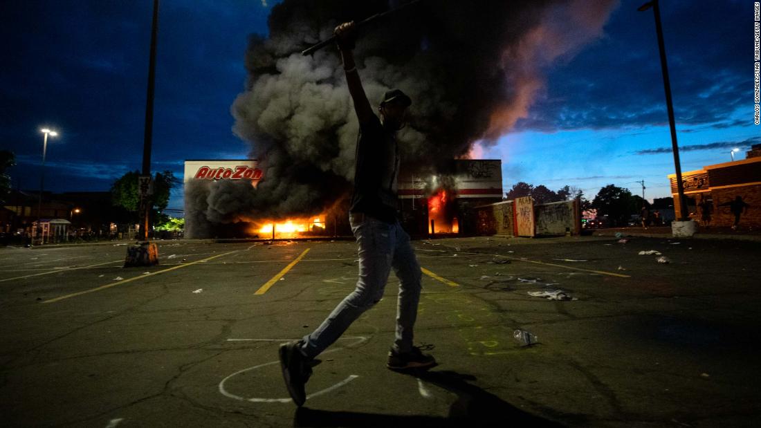 Minneapolis police identify 'Umbrella Man' who helped incite
George Floyd riots, warrant says 1