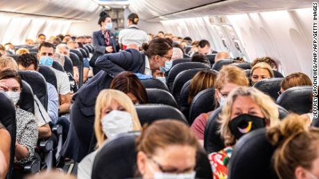 Airline bookings start to tumble again as coronavirus cases
spike 1