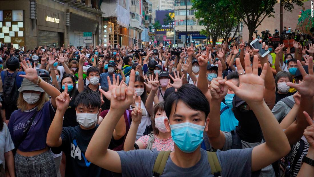 Hong Kong protest leader flees as government warns calls for
'revolution' are now illegal 1