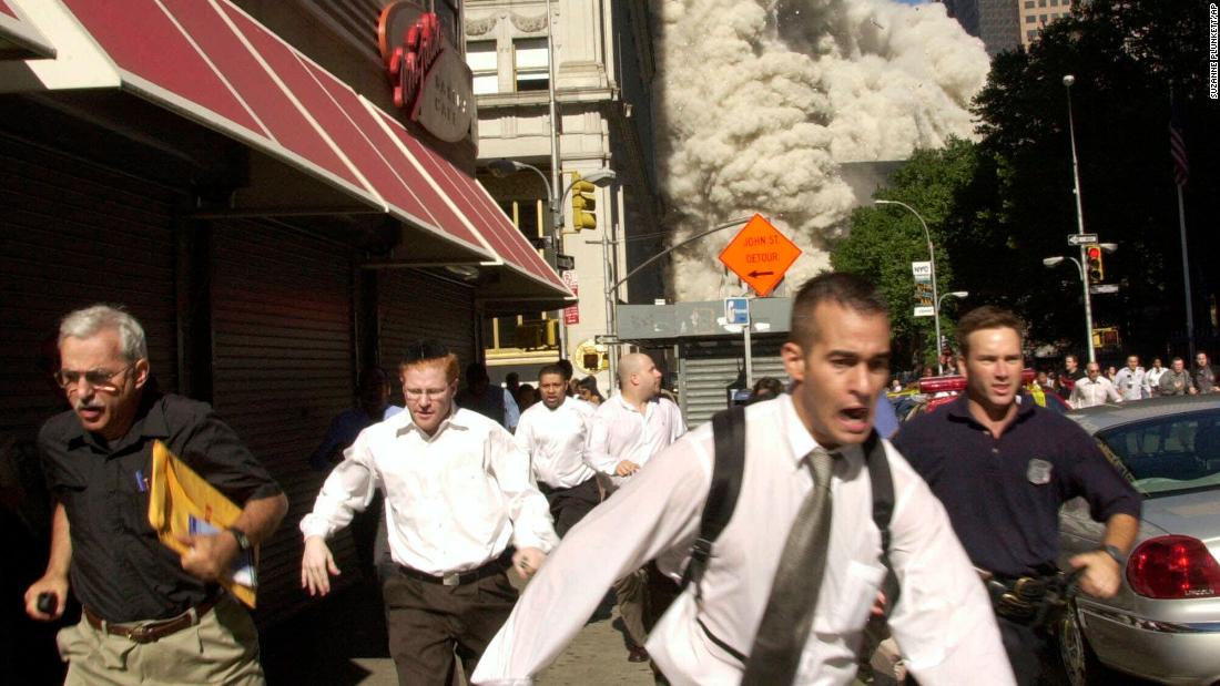 Man in famous 9/11 photo dies of Covid-19, his family
says 1