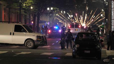 Several protesters arrested in Portland after police say
they blocked buildings and threw projectiles 1