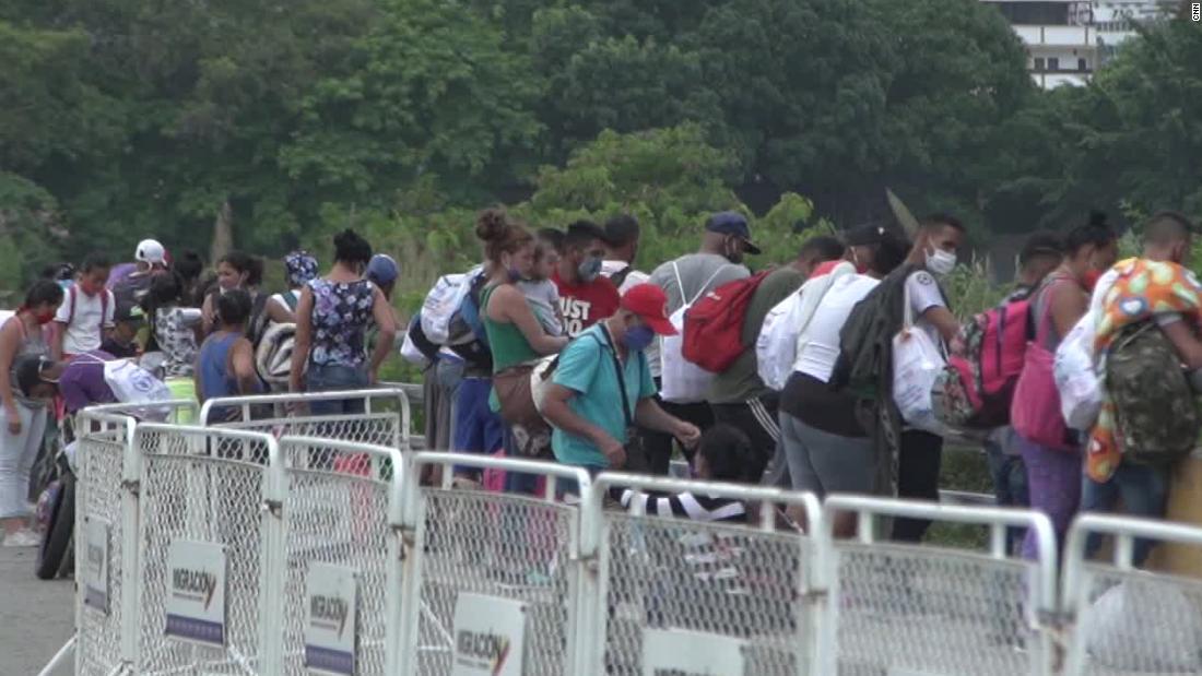 Venezuelan migrants fleeing Covid-19 get stuck at
border 1 Venezuelan migrants fleeing Covid-19 get stuck at
border 1