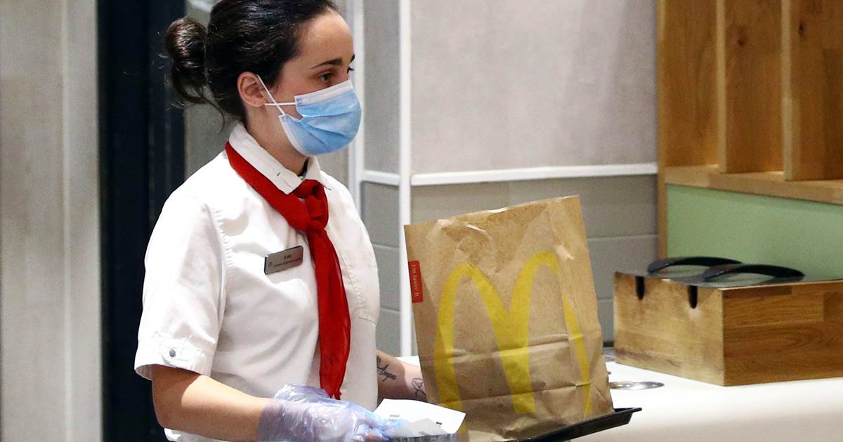 McDonald's to continue pause on dining room reopenings, will
require customers to wear masks 1