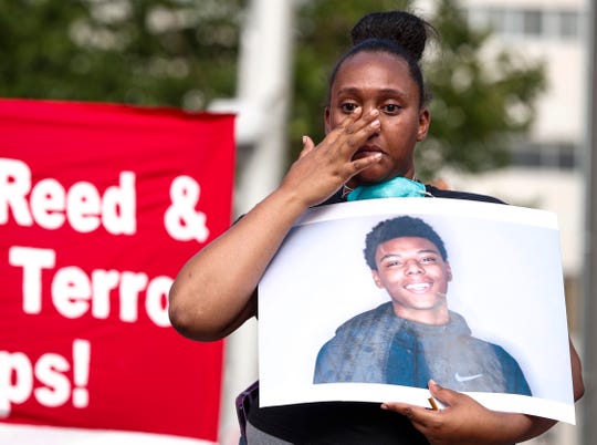 Indianapolis protesters seek autopsy results, accountability
in officer-involved shootings 1
