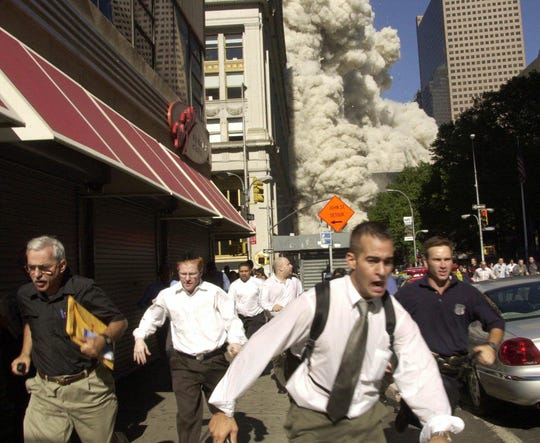 Man in famous 9/11 photo dies from COVID-19 in Florida: 'He
was a fighter' 1