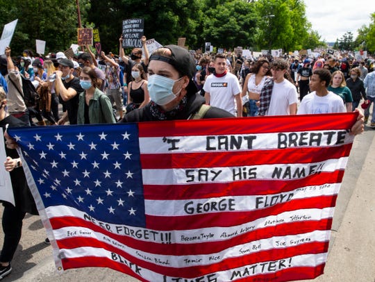 Amid protests and a pandemic, what does it mean to be
American in 2020? 1
